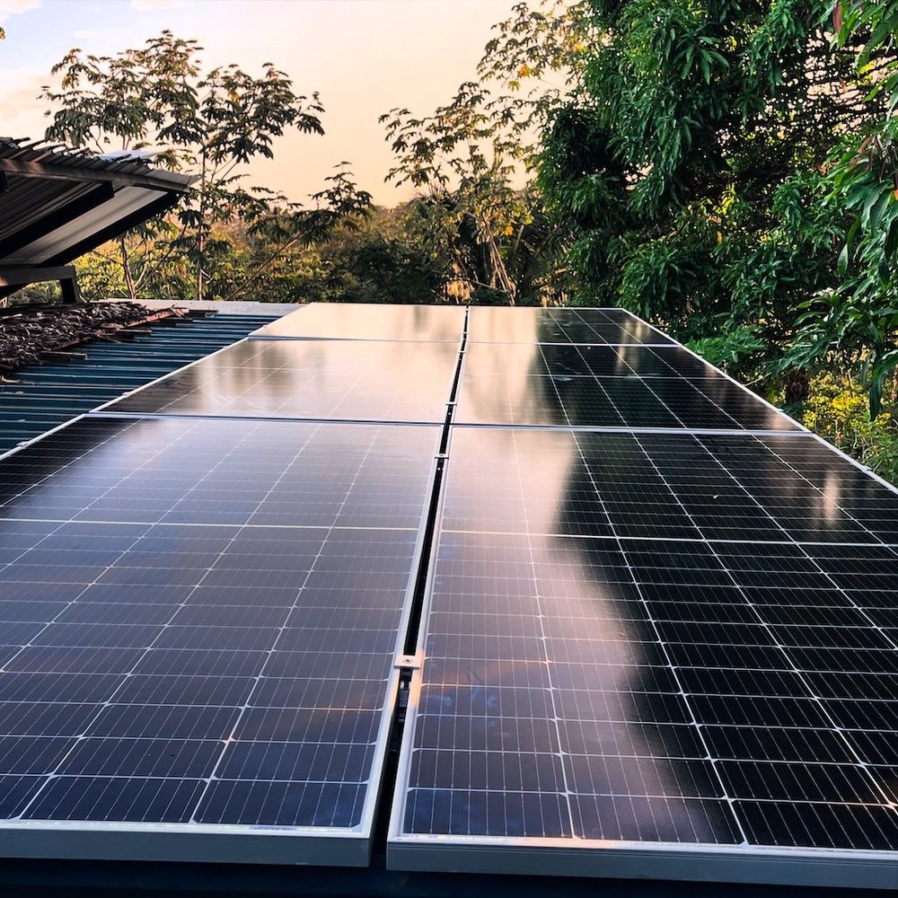 Solar panels on the roof of the residential Suntiago Energy project in Santiago, Costa Rica